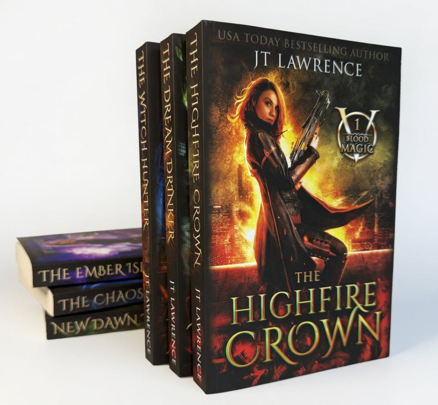 Blood Magic series by JT Lawrence: stack of the six paperbacks with The HighFire Crown on top